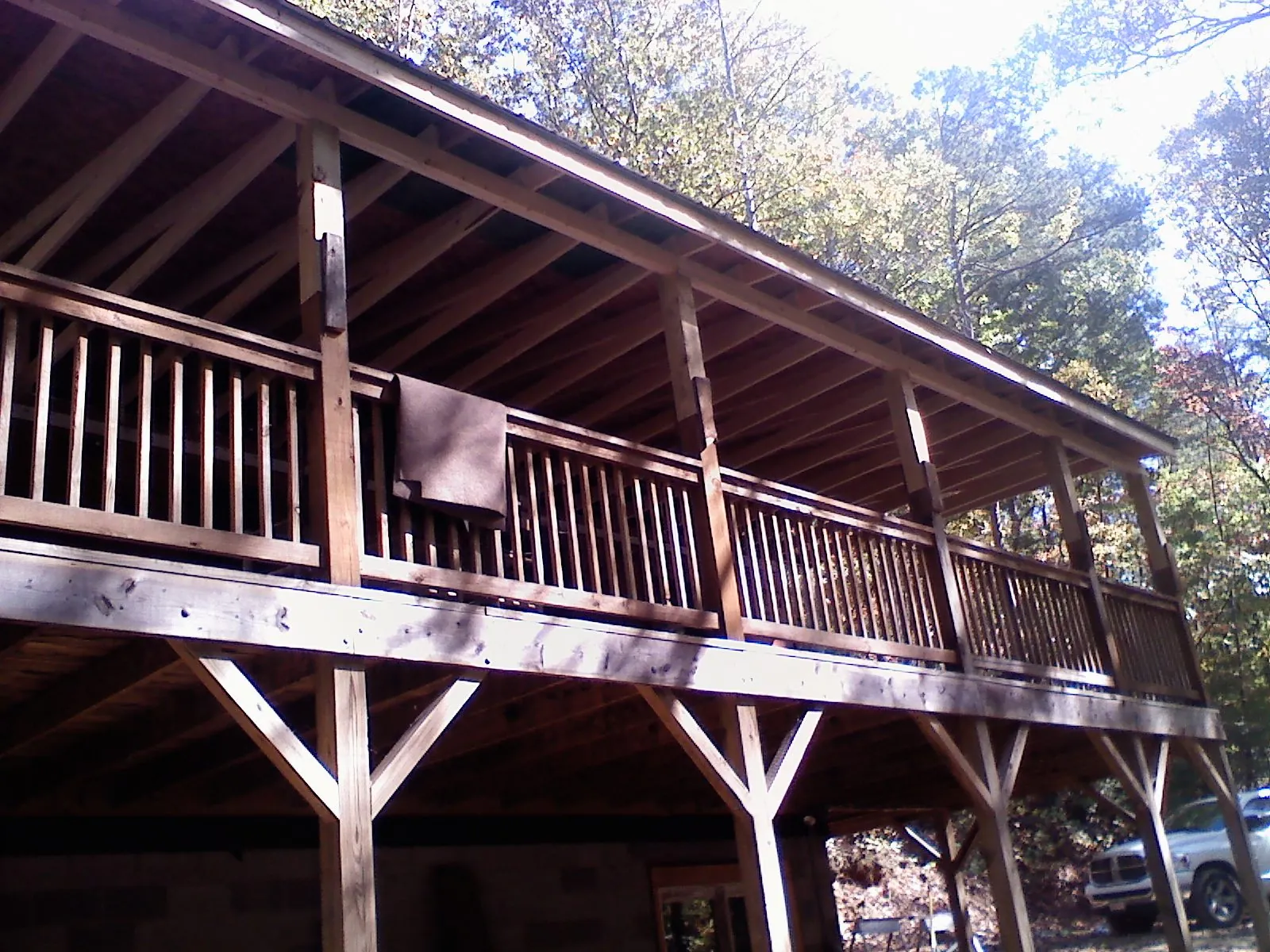 Timber framing under a new elevated porch and deck — Roof Leak Repair in Peabody by Roofing Brothers